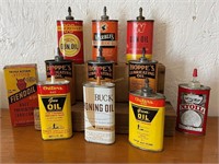 11 small company oil cans