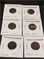 6-Indian head pennys   1 money