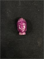 Tiny Carved Face Out of Purple Stone