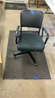 Rug with rubber backing, office chair