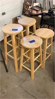 4 stools and a folding chair
