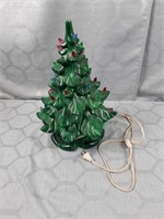 Ceramic Christmas tree. Has been repaired. Please