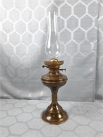 Brass oil lamp with glass chimney