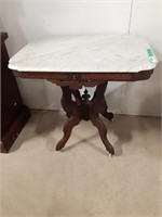 Marble top side table on wheels