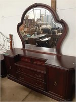Gorgeous stained oak rounded mirror dresser with
