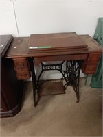 Singer sewing machine in table