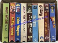 Flat of John Wayne VHS Tapes