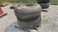 pallet of  gravity wagon wheels and tires