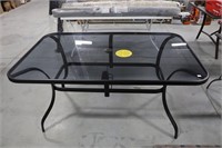 NEW GLASS TOP PATIO TABLE 60"X38"X29"