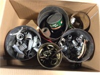 Cans of hardware in a box