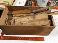 Wood box full of wood parts