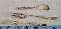 Small forks and serving piece marked Sterling