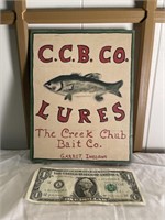 Hand lettered advertisement for CCB lures on wood