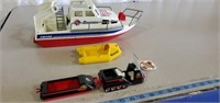 Toy rescue boat with accessories and  Playmobil