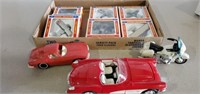 2 boxes model cars and Collectible airplanes in