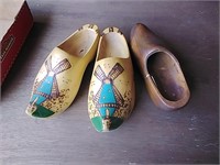 Three wooden shoes