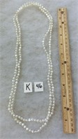 K-46 long strand of fresh water pearls