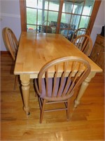 TABLE WITH FOUR CHAIRS; TABLE IS 29.5"H 59.5"LONG