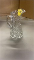 Heavy cut glass pitcher