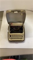 Vintage typewriter with case