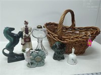 basket of figurines, bell, oil lamp base, etc.
