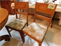 Four oak mid-century dinette chairs