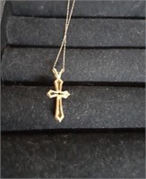 Gold necklace marked 14k with cross and chain