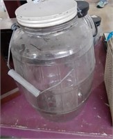 14 inch tall glass jar with lid looks like one