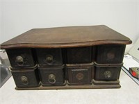 Antique 8 drawer sewing cabinet.