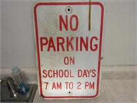 Metal street sign. No parking.