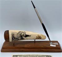 Scrimshawed Walrus Ivory Tusk tip depicting a Griz