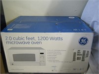 Brand new GE JES2051DNWW microwave