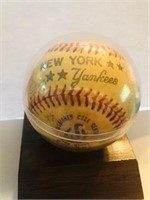 1980s NY Yankees Autographed Baseball in case