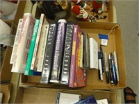 assorted books, pens