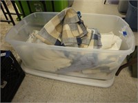 assorted sheets, towels, curtains