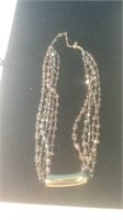 Heavy bead and gold tone necklace