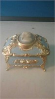 Blue and gold jewelry ring box with Cameo on top