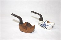 Pair of Clog-shoe pipes