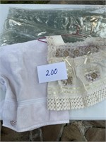 Plastic table cloth cover, towel, lace doll dress