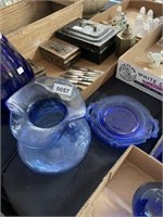 Blue glass vase and plates