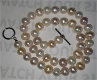 18 Inch Strand of Natural Pearls with Silver Clasp