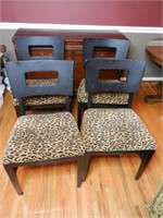 Four Black and Leopard Print Chairs