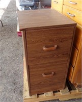 WOODEN CABINET W/BLACK COUNTERTOP AND....