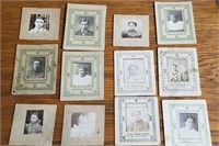 Small antique photos in paper frames,