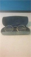 Antique wire rimmed glasses in era case
