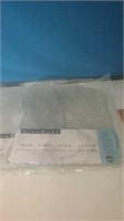 Two pairs of twin fish sink liners new in package