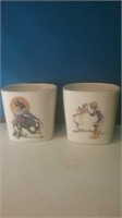 Group of to Norman Rockwell planters 5 in tall
