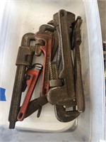 Lot of smaller pipe wrenches