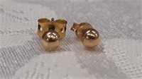 Pair of small gold studs not sure of the Karat