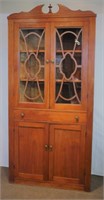 Corner cabinet with four doors one drawer,